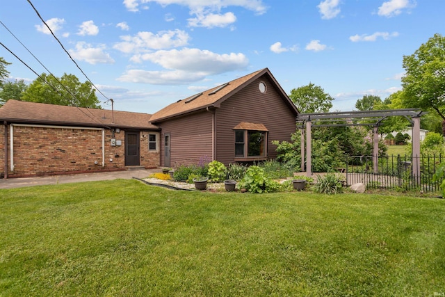 view of front of house with a pergola, brick siding, and a shingled roof