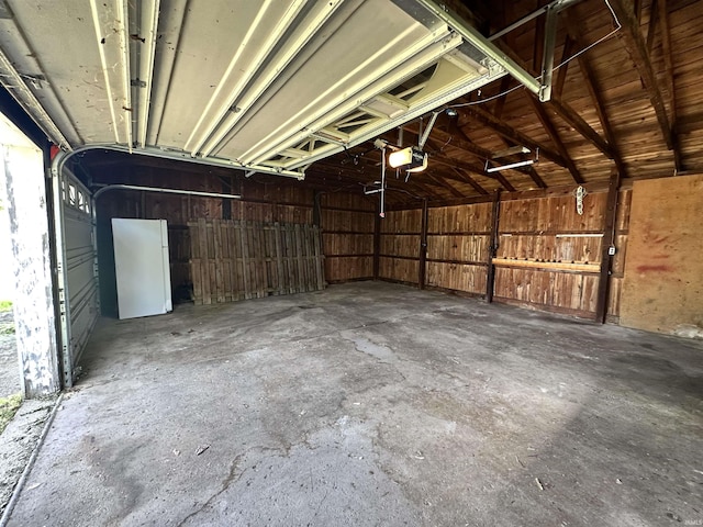 7831 S State Road 19, Peru, IN 46970 - garage featuring a garage door opener