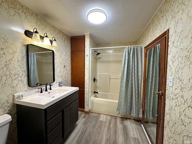 7831 S State Road 19, Peru, IN 46970 - full bathroom featuring wood finished floors, vanity, shower / bathtub combination with curtain, and toilet