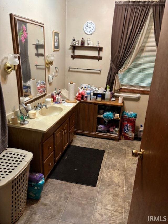 109 E Water St, Montpelier, IN 47359 - bathroom with vanity and tile patterned floors