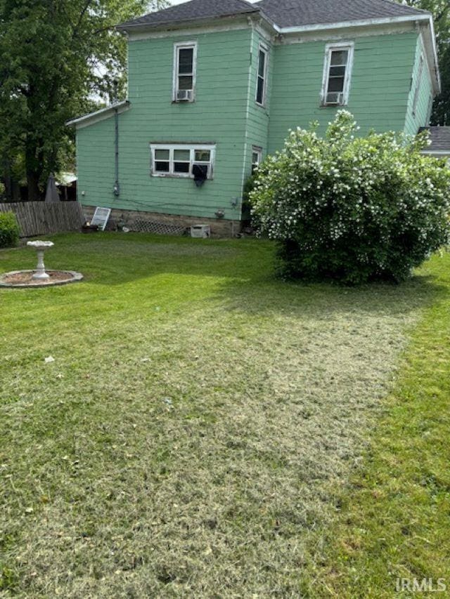 109 E Water St, Montpelier, IN 47359 - rear view of property featuring cooling unit and roof with shingles