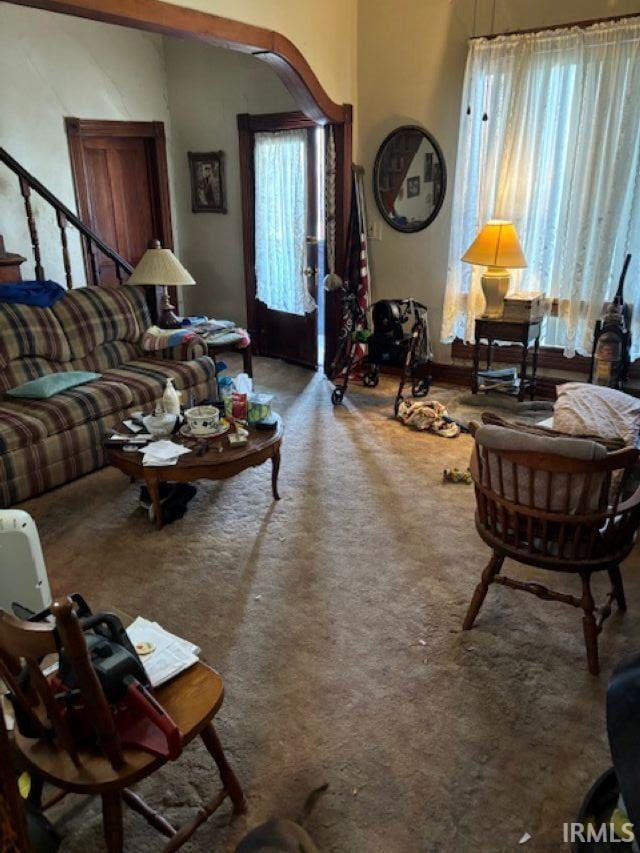 109 E Water St, Montpelier, IN 47359 - living area featuring stairs and carpet