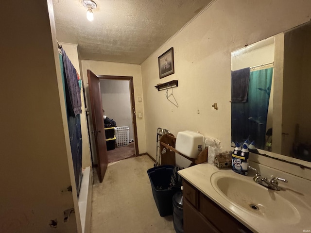 9615 S Olive St, Muncie, IN 47302 - bathroom featuring a textured ceiling, vanity, curtained shower, and toilet