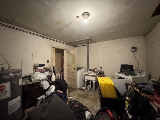 9615 S Olive St, Muncie, IN 47302 - below grade area featuring water heater and independent washer and dryer