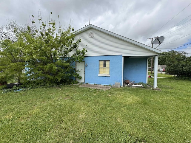 9615 S Olive St, Muncie, IN 47302 - back of house featuring a yard