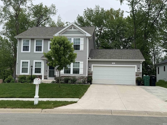 716 Gentry Ln, New Carlisle, IN 46552 - colonial inspired home with stone siding, concrete driveway, a front lawn, a garage, and roof with shingles