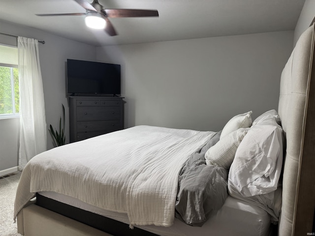 716 Gentry Ln, New Carlisle, IN 46552 - carpeted bedroom featuring baseboards and a ceiling fan