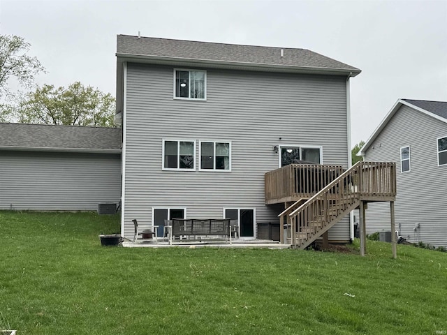 716 Gentry Ln, New Carlisle, IN 46552 - rear view of house with a wooden deck, a yard, stairway, central air condition unit, and a patio area