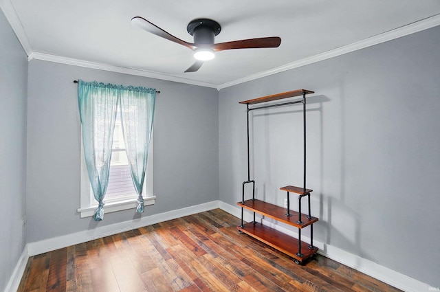 bedroom with crown molding, baseboards, dark wood-style flooring, and a ceiling fan