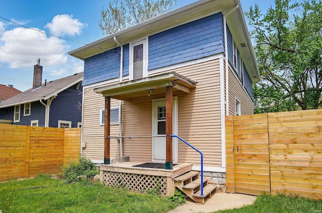 view of front of home with fence