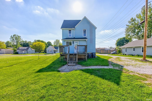121 Diehl St, Tipton, IN 46072 - view of front of property with a deck and a front yard