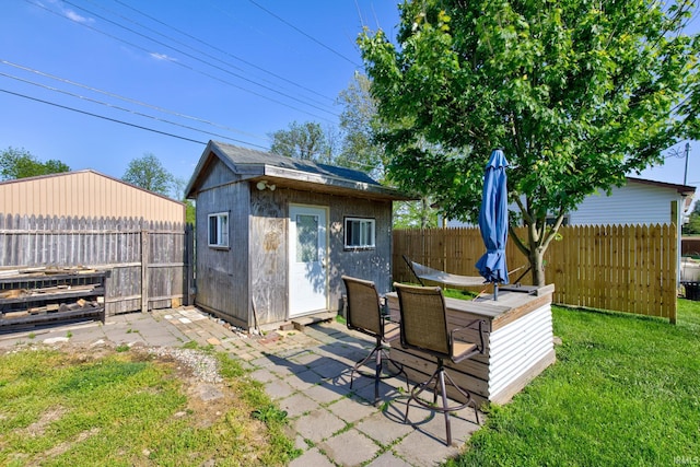 121 Diehl St, Tipton, IN 46072 - view of shed with a fenced backyard