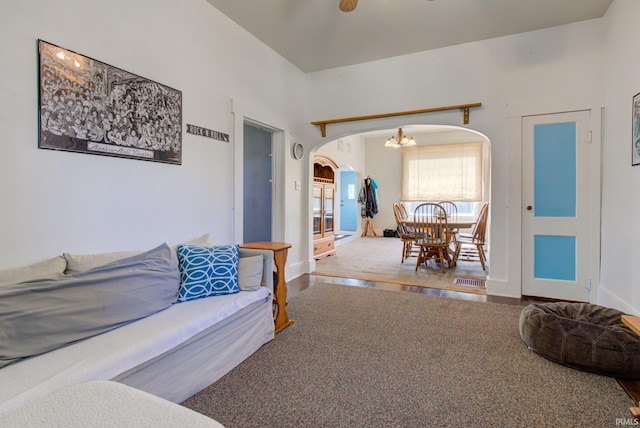 121 Diehl St, Tipton, IN 46072 - living room featuring arched walkways and a chandelier