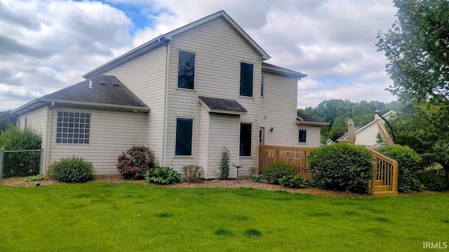 7751 E Fibia Pl, Fort Wayne, IN 46818 - back of property featuring roof with shingles