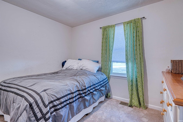 1616 N Roosevelt Dr, Evansville, IN 47711 - carpeted bedroom with baseboards