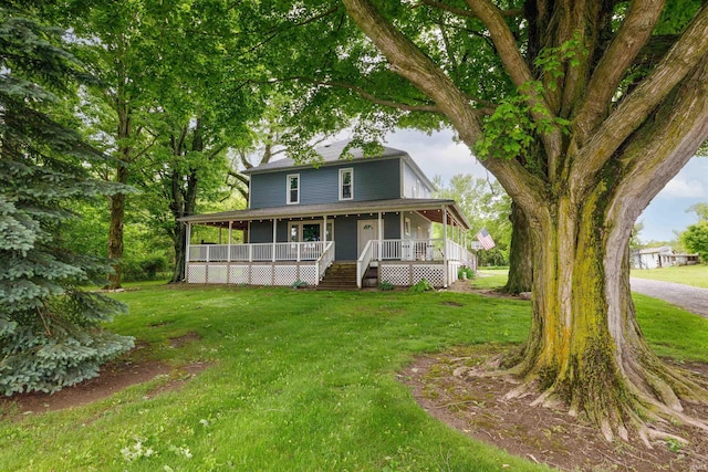 1239 County Road 28th Rd, Corunna, IN 46730 - country-style home with covered porch and a front yard
