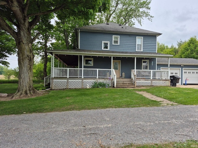 1239 County Road 28th Rd, Corunna, IN 46730 - view of front of home featuring covered porch, a front lawn, driveway, and a garage
