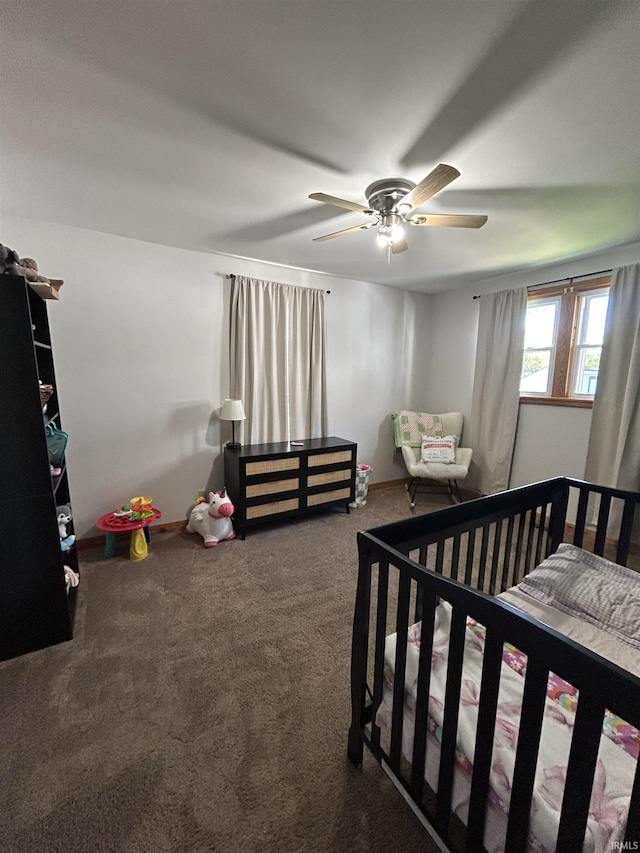 312 W Columbia St, Oakland City, IN 47660 - carpeted bedroom with a ceiling fan