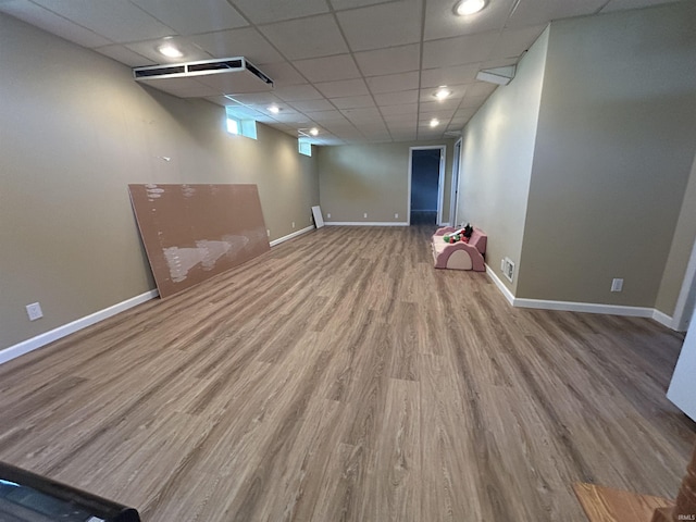 312 W Columbia St, Oakland City, IN 47660 - basement with wood finished floors, baseboards, and a paneled ceiling