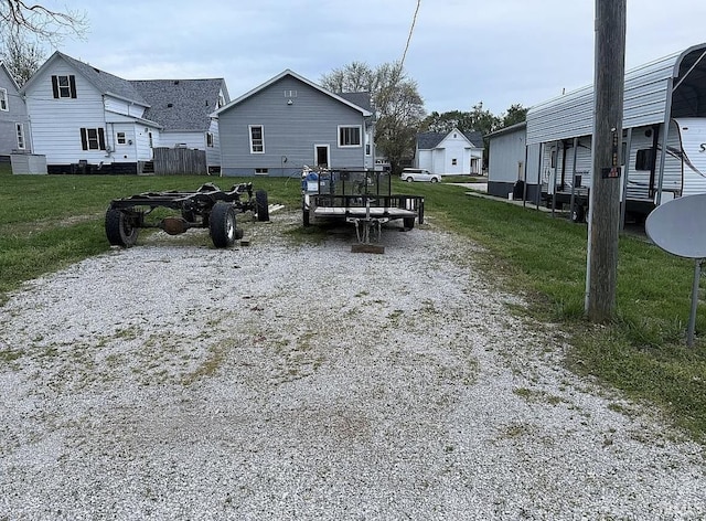 312 W Columbia St, Oakland City, IN 47660 - view of grassy yard with gravel driveway