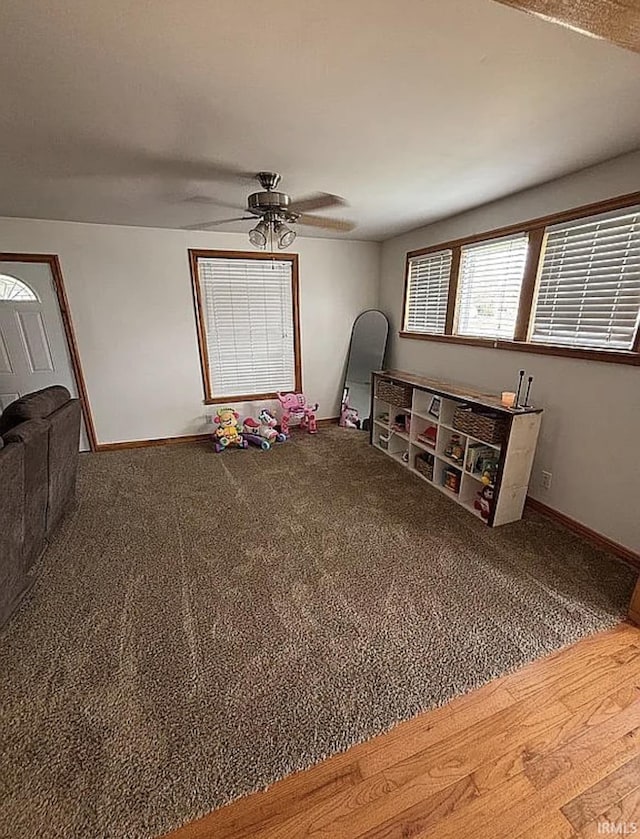 312 W Columbia St, Oakland City, IN 47660 - spare room featuring a ceiling fan, carpet, and baseboards