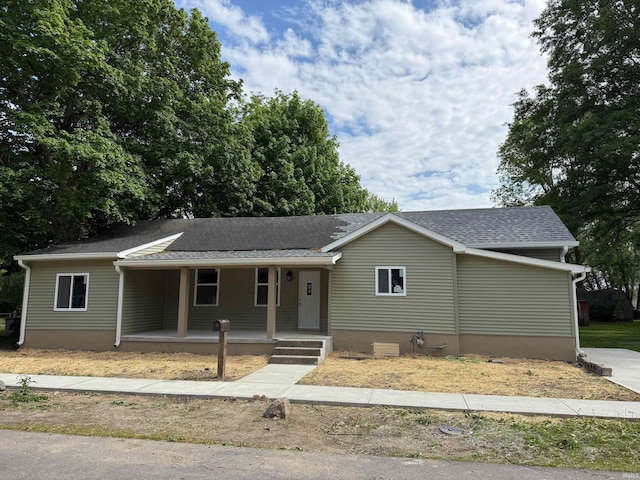 404 W Capitol St, Flora, IN 46929 - single story home featuring covered porch and roof with shingles