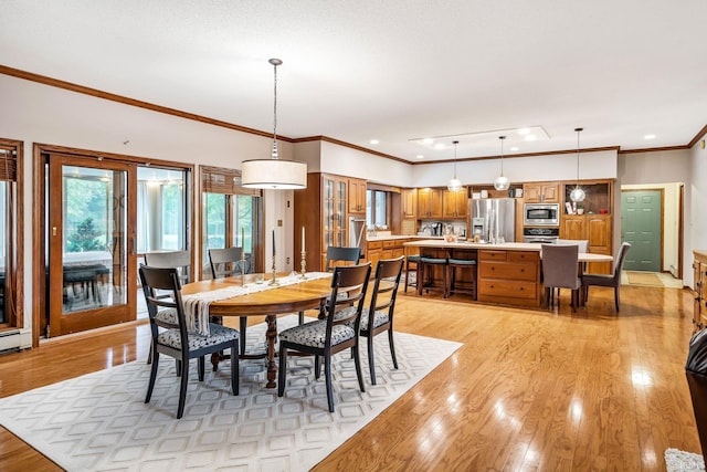 13392 N State Road 13, North Manchester, IN 46962 - dining area featuring light wood-type flooring, ornamental molding, and recessed lighting