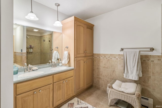 13392 N State Road 13, North Manchester, IN 46962 - full bath with baseboard heating, tile walls, a stall shower, tile patterned flooring, and double vanity