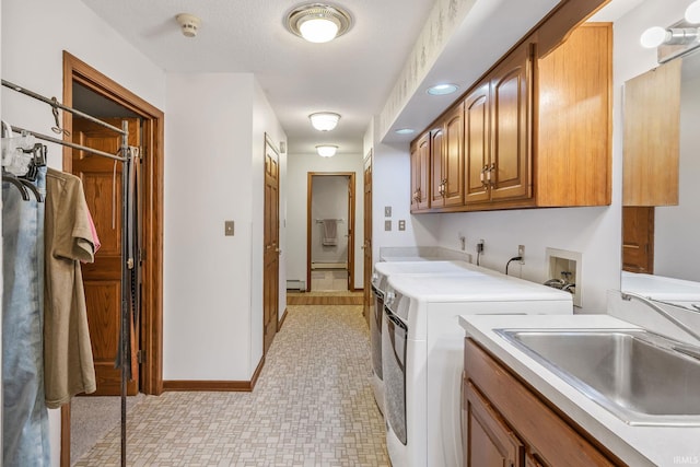 13392 N State Road 13, North Manchester, IN 46962 - washroom featuring cabinet space, independent washer and dryer, a baseboard radiator, and baseboards