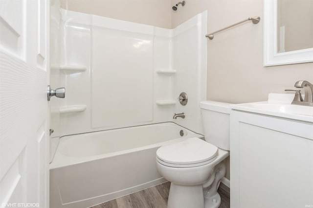 1842 Obrien St, South Bend, IN 46628 - full bathroom featuring wood finished floors, toilet, vanity, and bathing tub / shower combination