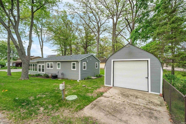 3 Ems T20 Ln, Leesburg, IN 46538 - detached garage featuring driveway and central AC unit