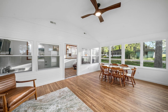 3 Ems T20 Ln, Leesburg, IN 46538 - sunroom / solarium featuring healthy amount of natural light, wood finished floors, vaulted ceiling, a wooden deck, and baseboards