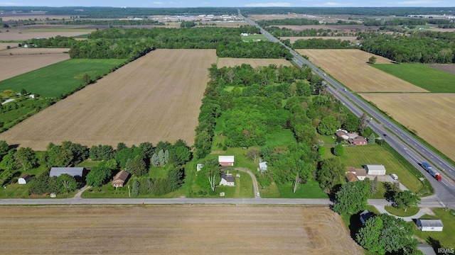 56611 Tulip Rd, New Carlisle, IN 46552 - aerial overview of property's location with rural landscape and rows of crops