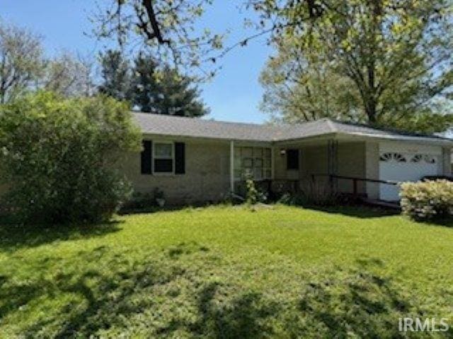 2402 Greytwig Dr, Kokomo, IN 46902 - single story home with an attached garage and a front lawn