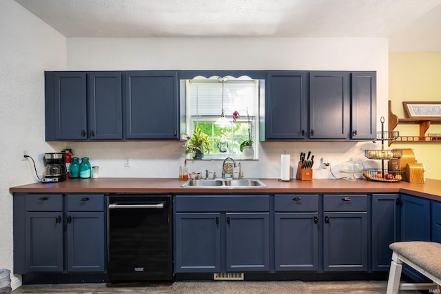 kitchen featuring a sink, blue cabinets, and black dishwasher