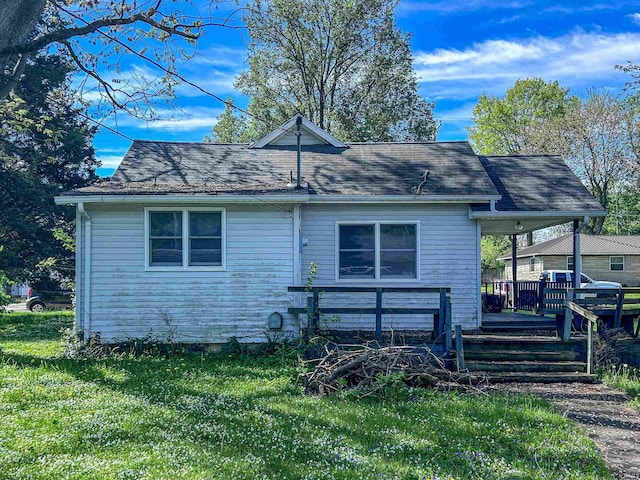 315 W Butcher St, Geneva, IN 46740 - back of property featuring a yard