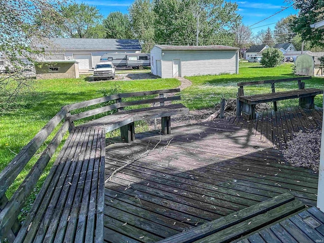 315 W Butcher St, Geneva, IN 46740 - wooden terrace featuring a lawn and an outdoor structure