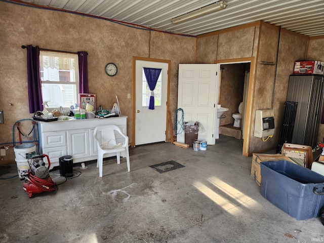 garage featuring heating unit