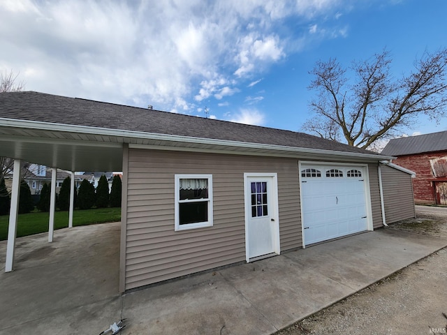 garage with driveway
