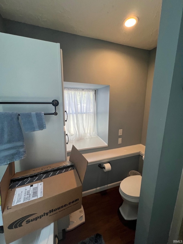 1206 King St, Lafayette, IN 47905 - bathroom featuring wood finished floors, toilet, and recessed lighting