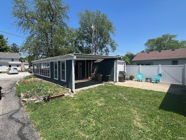 1206 King St, Lafayette, IN 47905 - back of property with a patio and board and batten siding