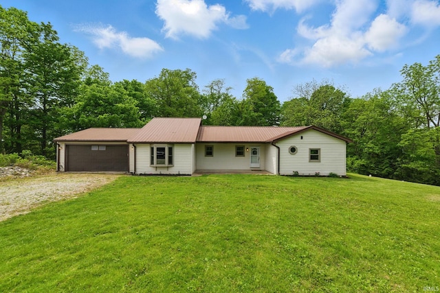 7956 N 225 W, Delphi, IN 46923 - single story home featuring driveway, a garage, a front yard, and metal roof