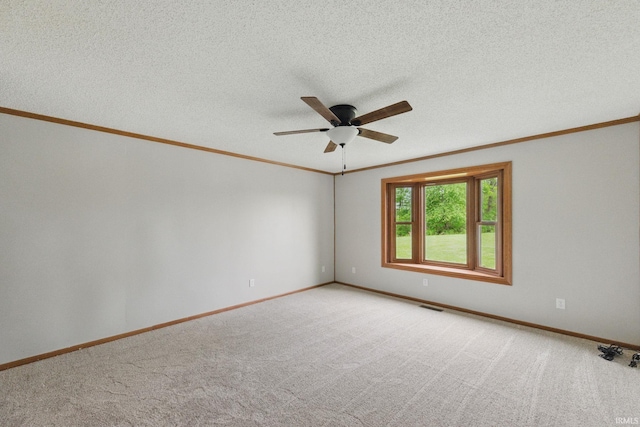 7956 N 225 W, Delphi, IN 46923 - spare room with ornamental molding, ceiling fan, light carpet, baseboards, and a textured ceiling