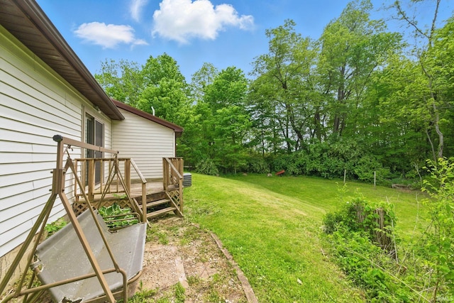 7956 N 225 W, Delphi, IN 46923 - view of green lawn with a deck