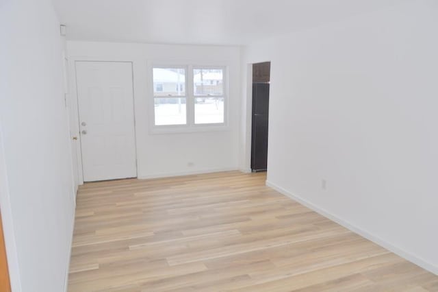 3333 Eastwood Dr, Fort Wayne, IN 46805 - empty room with light wood-style floors and baseboards