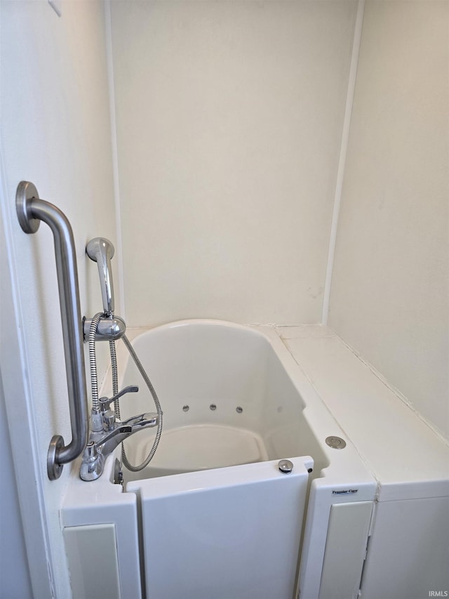 full bathroom with a bath