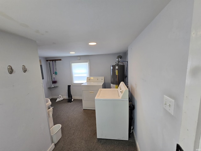 washroom with water heater, dark carpet, independent washer and dryer, recessed lighting, and baseboards