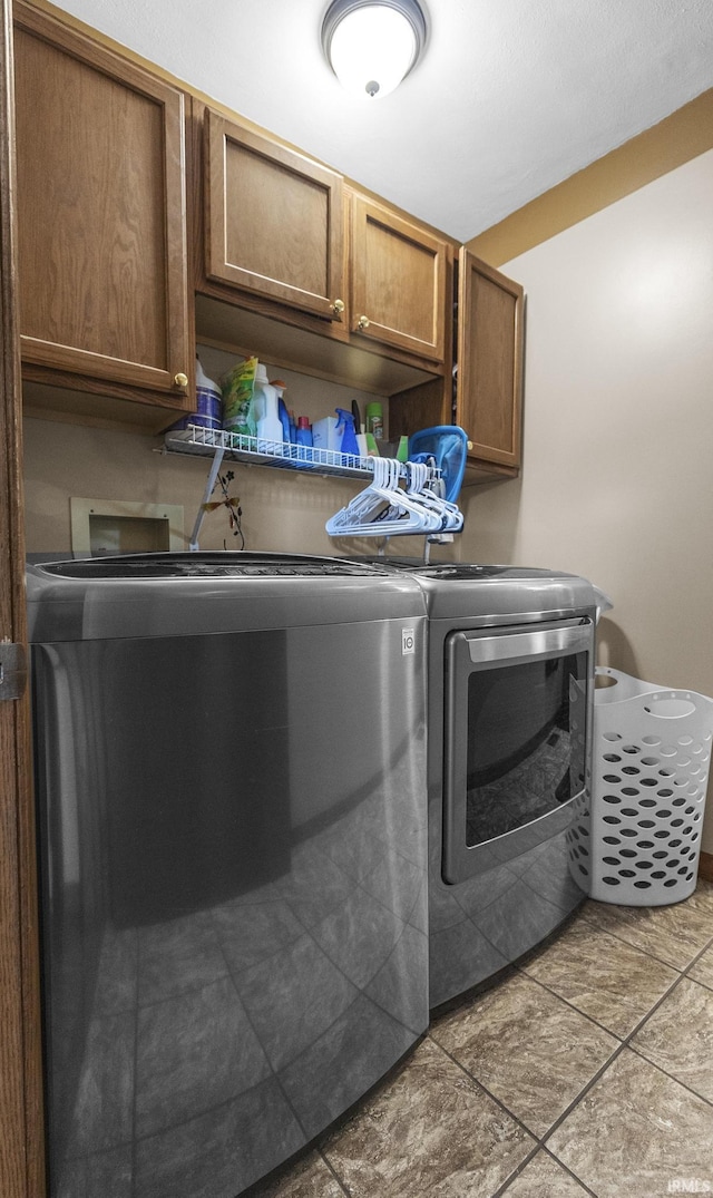 1376 N Hayland Dr, Jasper, IN 47546 - laundry area with cabinet space and washer and dryer