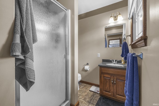 1376 N Hayland Dr, Jasper, IN 47546 - full bath featuring a stall shower, vanity, toilet, and baseboards