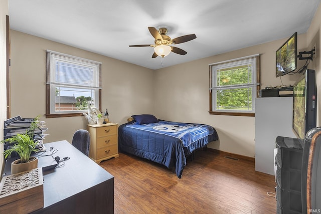 1376 N Hayland Dr, Jasper, IN 47546 - bedroom with multiple windows, wood finished floors, and ceiling fan